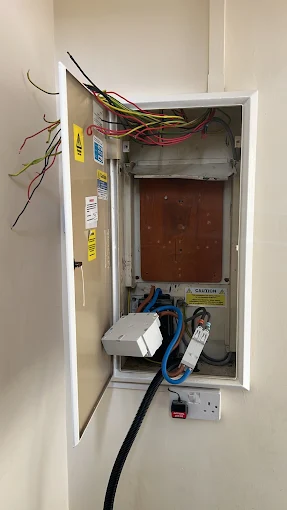 Cupboard board enclosure prepared for a new installation
